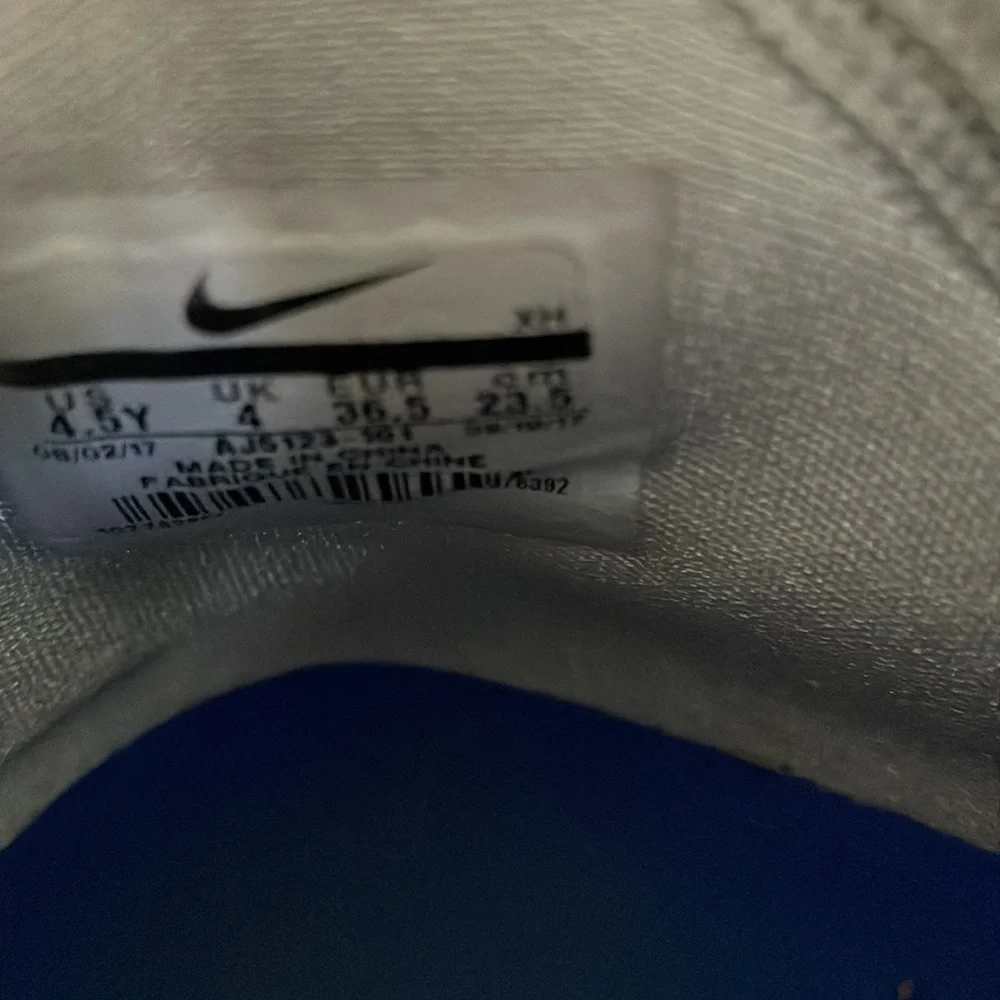 Nike tear preowned throughout